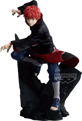 A figurine of a character from Naruto Shippuden, posed dynamically on a rocky base.
