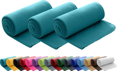 A collage of rolled-up fleece blankets in various colors, with three teal blankets prominently displayed at the top.