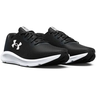 A pair of black Under Armour running shoes with white soles and white logos.