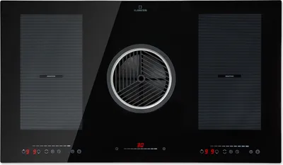 A top-down view of a black induction cooktop with an integrated downdraft ventilation system in the center.