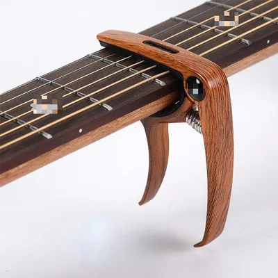 Immagine prodotto di Portacorde 3 in 1, per ukulele e chitarra elettrica, set da 2, clip per accordi e trasposizioni, effetto legno scuro
