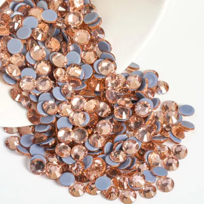 Image de Strass thermocollants - À fixer sur les textiles par repassage - Couleur champagne - Taille SS30 / 288 pièces