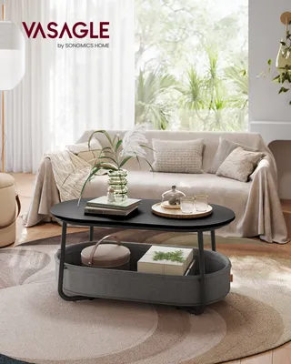 A stylish living room scene featuring a coffee table and sofa.