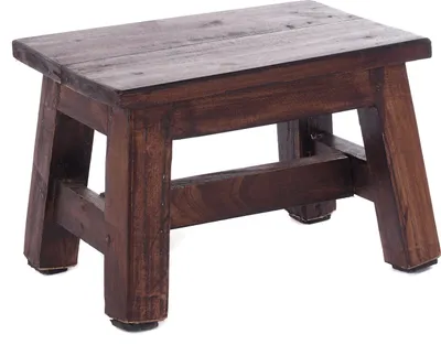 A small, dark brown wooden stool is shown against a white background.