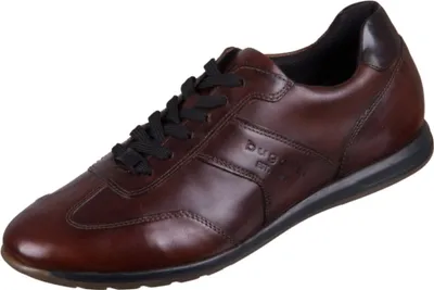 A single brown leather shoe is shown against a white background.
