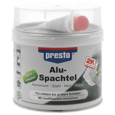 A white tub of Presto 2K Alu Spachtel with a clear plastic lid, showing a small tube of hardener inside.