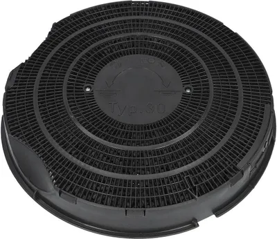 A black circular carbon filter for a cooker hood, shown from a slightly elevated angle against a white background.