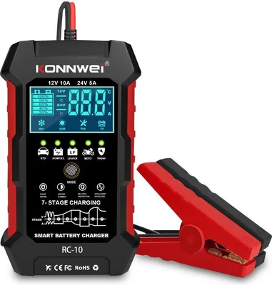 A black and red battery charger with a digital display and attached red and black clamps, shown against a white background.