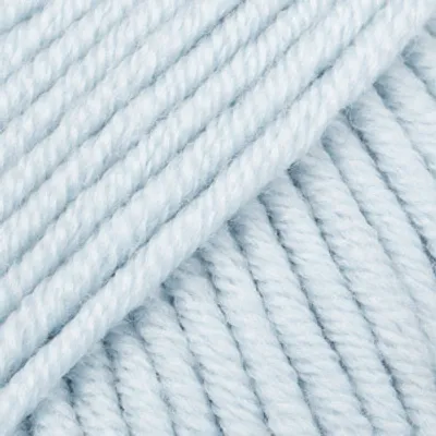 A close-up view of light blue yarn.