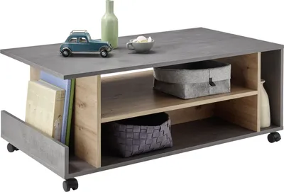 Produktbild von Couchtisch HARVEY 108 x 60 mit Rollen Optik: Betongrau / Artisan Eiche