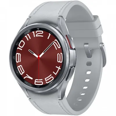 A close-up studio shot of a smartwatch with a red face and a silver band.