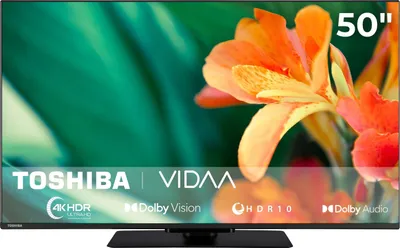 A television screen displaying a vibrant image of orange flowers with green leaves, along with brand and feature logos.