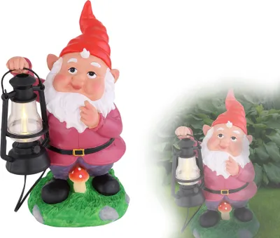 A garden gnome holding a lantern, with a smaller mushroom at its base, set against a white background and a blurred outdoor scene.