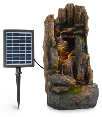 Produktbild von Blumfeldt Mystic Tree Solarbrunnen, inkl. Solarpanel, Lithium-Ionen-Akku (ca. 5h Laufzeit), LED-Beleuchtung, Polyresin| frostbeständig, für drinnen und draußen, Holzoptik