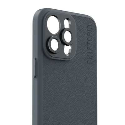 A close-up view of the back of a dark grey iPhone case, showing the camera lens area and embossed branding.