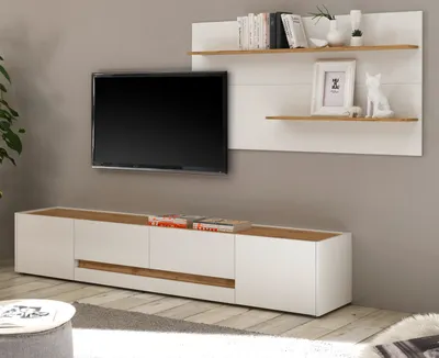 A modern TV stand and wall-mounted shelf unit in a living room setting.