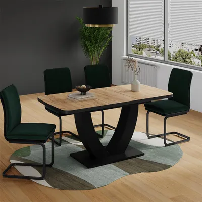 A dining table with chairs in a room setting.