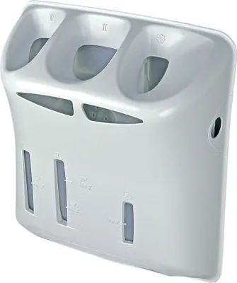 A white plastic washing machine detergent dispenser drawer.