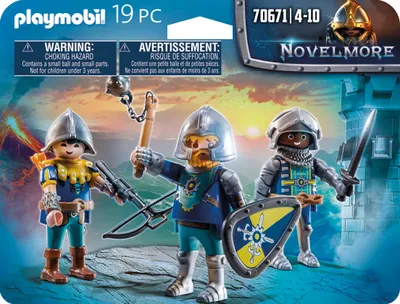 Playmobil Novelmore knights in a battle scene with a castle in the background.