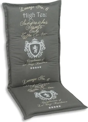 A gray chair cushion with embroidered text and a crest.