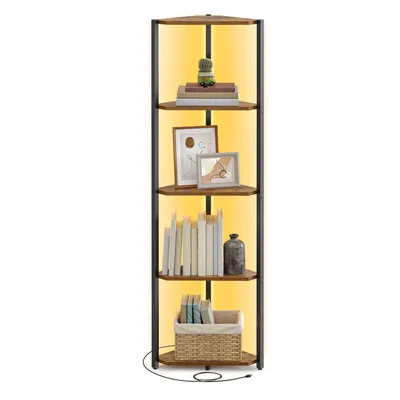 A tall, corner bookshelf with five shelves, illuminated by yellow LED lights. It displays books, framed pictures, a decorative item, and a basket.