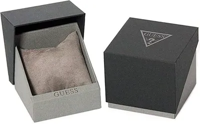Two Guess watch boxes, one open showing the interior and a cushion, and one closed with the Guess logo.