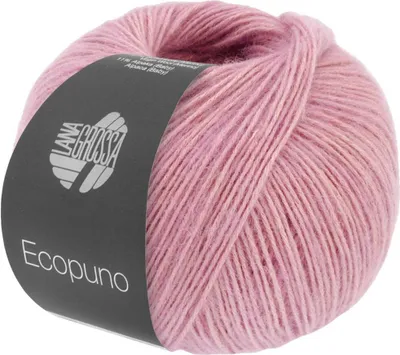 A ball of pink yarn with a dark gray label.