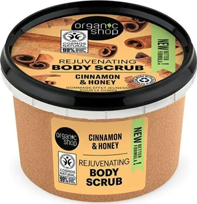 A product shot of a body scrub container with cinnamon and honey branding.