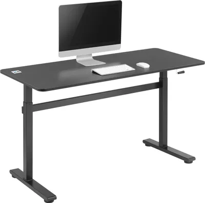 A black adjustable height desk with a computer monitor, keyboard, and mouse on top, set against a white background.