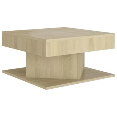 A light brown wooden coffee table with a modern, geometric design, shown against a white background.