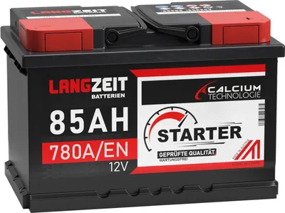 A black car battery with red and white branding.