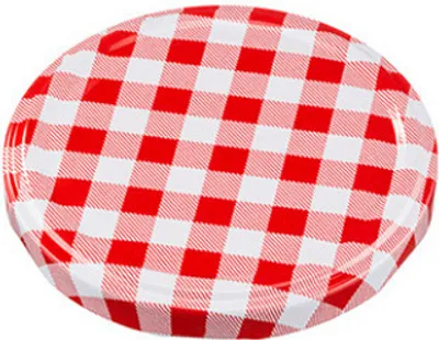 A close-up, top-down view of a red and white checkered jar lid.