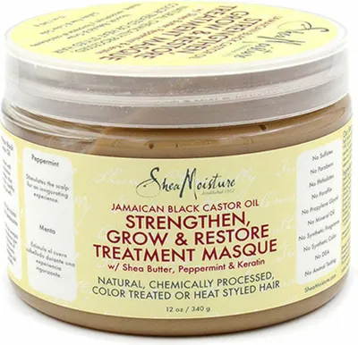 A jar of Shea Moisture Jamaican Black Castor Oil Strengthen, Grow & Restore Treatment Masque.