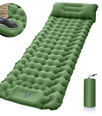 A green inflatable sleeping mat with a pillow section, shown inflated and laid out, with a close-up inset of a foot stepping on it. A rolled-up version of the mat is also shown.