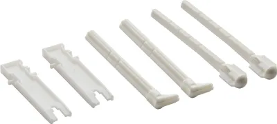 A set of white plastic plumbing components arranged on a white background.