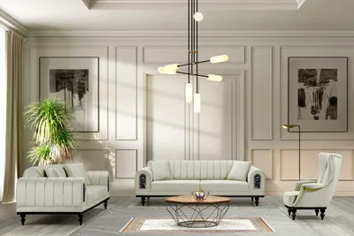 A modern living room setting with a beige couch set, coffee table, and decorative elements.