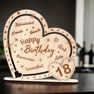 Produktbild von Kunstvoll graviertes Holz-Herz zum 18. Geburtstag mit Lieben Worten, zum Aufstellen als Geburtstagsgeschenk & Tisch-Dekoration, mit Standfuß 18x18x4cm