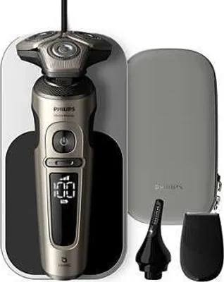 A Philips electric shaver and its accessories are displayed against a white background.