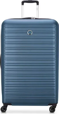 A blue suitcase with a retractable handle and wheels, shown from the front.
