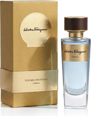A product shot of a perfume bottle and its packaging.