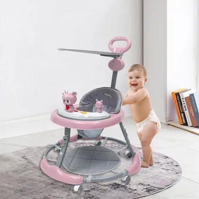 Immagine prodotto di Girello - Pieghevole - Regolabile in altezza - Musica - Protezione antiribaltamento - Previene le gambe a O - 4 ruote - Rosa