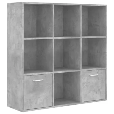 A gray, concrete-effect cube shelf unit with nine compartments, two of which have drawers with silver handles.