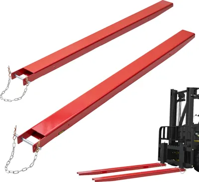Two red forklift extensions are shown in the foreground, with a partial view of a black forklift in the background.