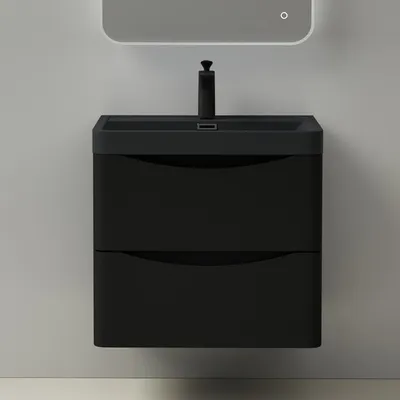 A modern black vanity unit with a sink and faucet, mounted on a wall.