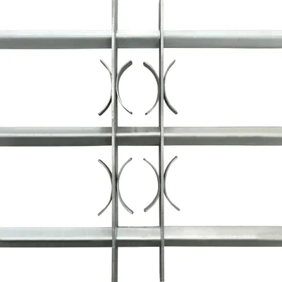 A close-up view of a metal grate or fence.