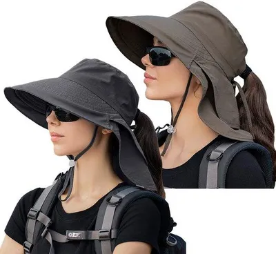 Immagine prodotto di Cappello da sole da donna Unyqoos® con protezione UV 50 – 100% nylon, circonferenza testa 55,3–58,5 cm, tesa 13,5 cm, protezione per il collo 18 cm, coulisse regolabile e cintino sotto il mento, apertura per la coda di cavallo, pieghevole