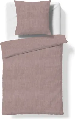A top-down view of a duvet cover and pillowcase set laid out on a white surface.