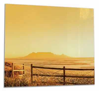 Produktbild von Wallario Herdabdeckplatte aus Glas, Größe 60 x 52 cm 1-teilig, Motiv Strand in Südafrika I - Himmel in orange