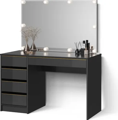 A black vanity table with a large mirror and LED lights, decorated with vases and perfume bottles.