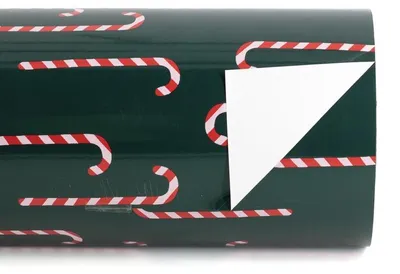 Productafbeelding van HomeBound cadeaufolie met suikerstokjesprint – rol van 50 cm x 100 m